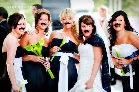 fun-bridesmaids-photo-wearing-mustaches-white-black-bridesmaids-dresses-green-white-calla-lillies