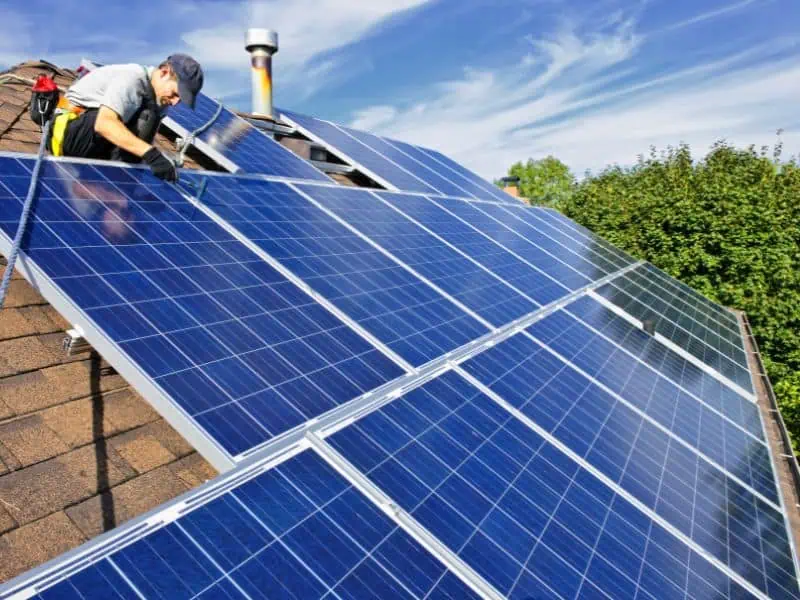 installing solar panels on a house