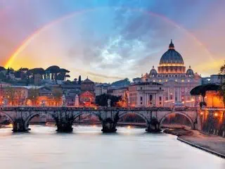 The Vatican with a rainbow