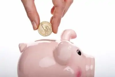 save money in a piggy bank