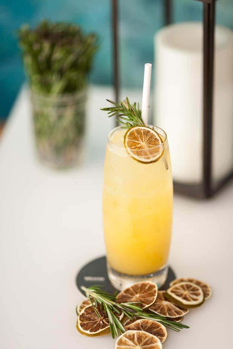 passion fruit cocktail with rosemary