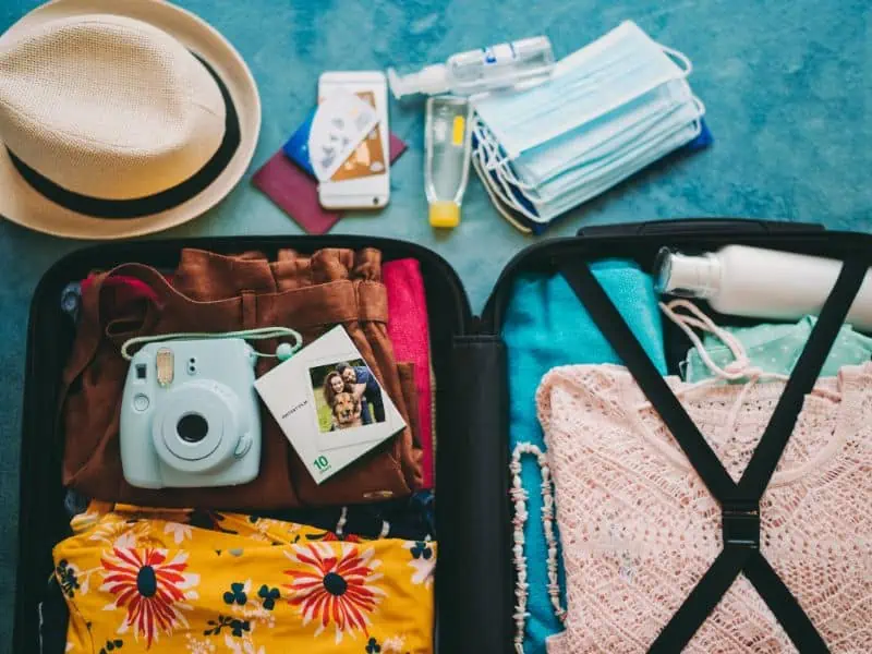 vacation packing open suitcase