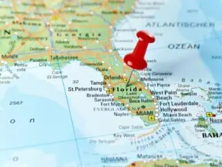 map of florida with a red pin